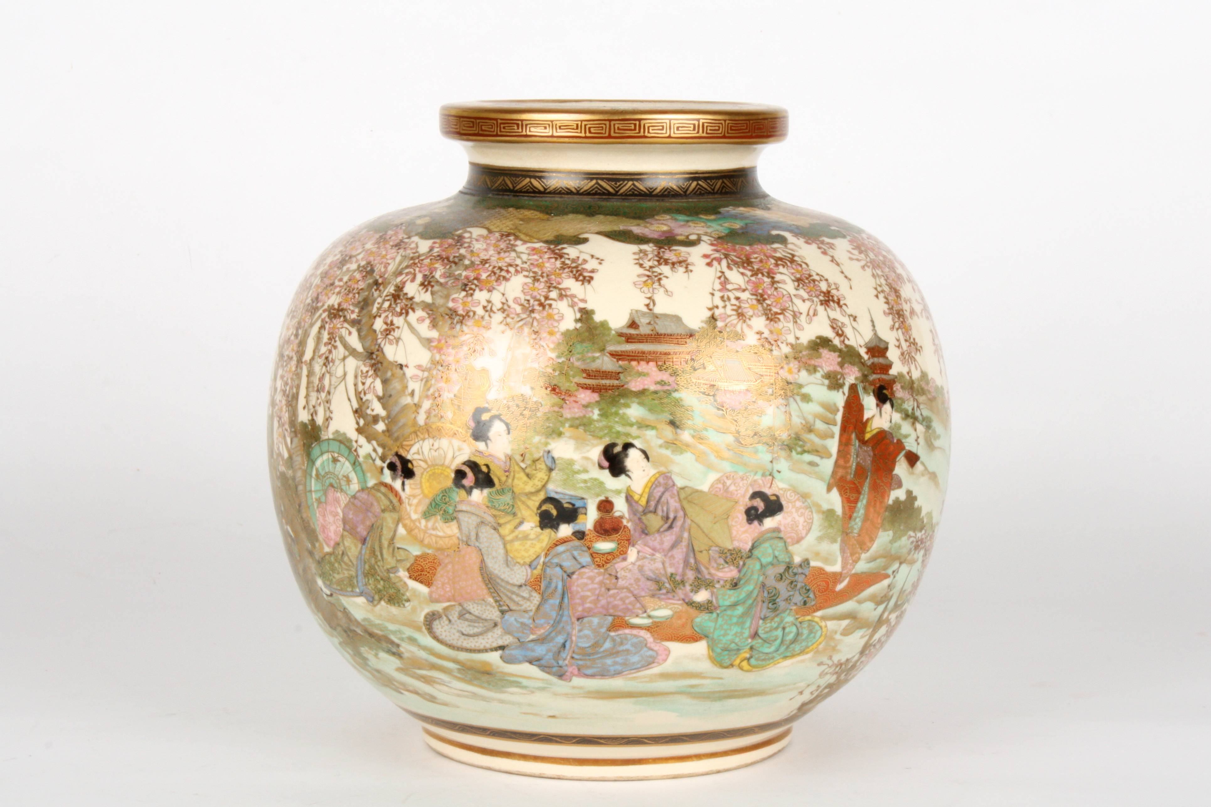 A large Japanese Satsuma globular vase
circa 1900, finely painted all round with a scene of ladies