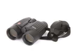 A pair of Leica 10 x 42 BA binocularsmarked Trinovid, number 1020051, in original case,