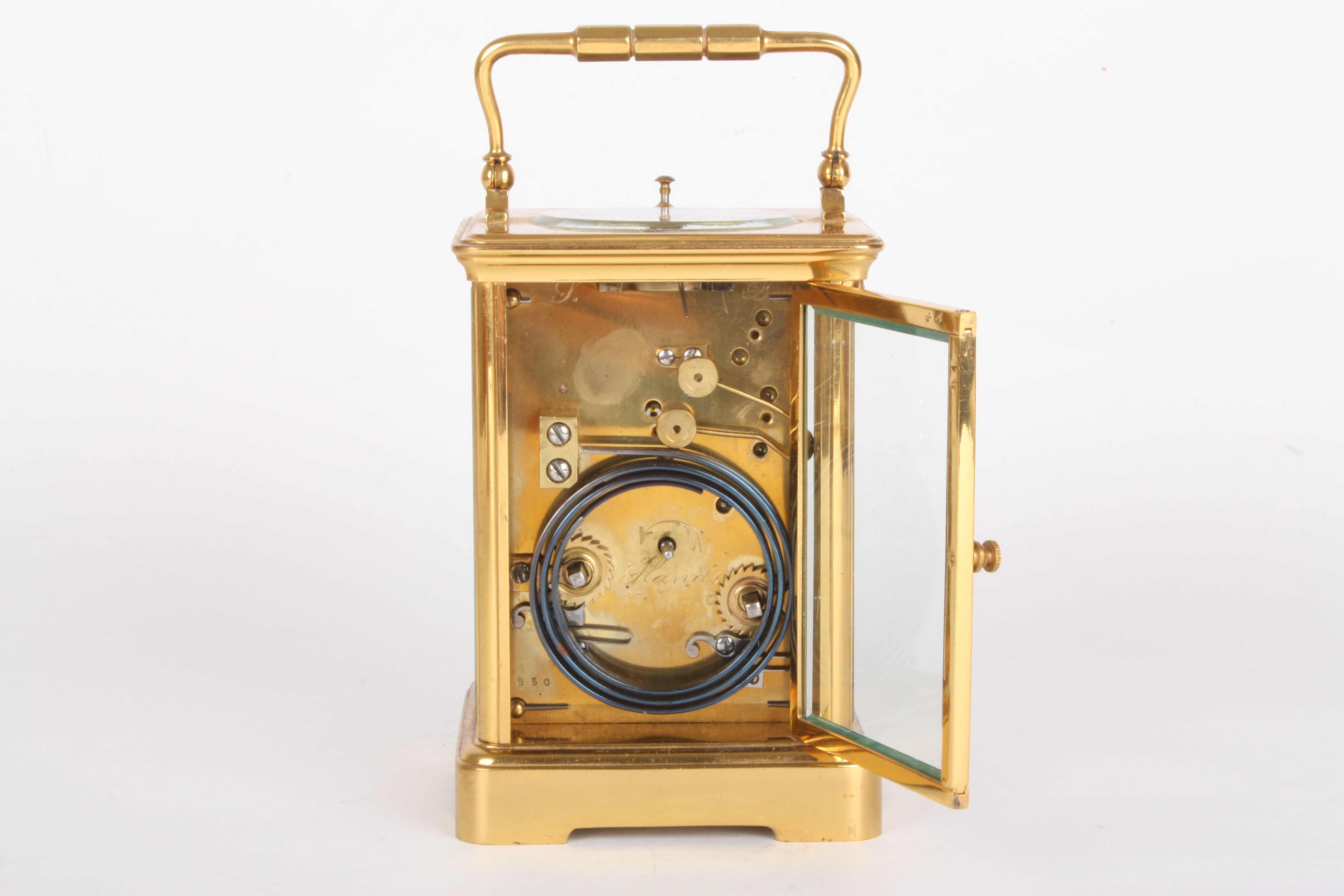 A Victorian brass carriage clock retailed by Goldsmiths Company
with repeating movement, the white - Image 3 of 4