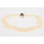 A triple row graduated cultured pearl necklace
the 3.5mm to 8mm pearls of uniform colour and