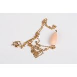 A coral pear shaped drop pendant necklace
suspended from a 9ct gold chain, Condition: Good