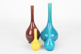 A group of four late 19th century Chinese bottle vaseswith globular bottles and slender necks,