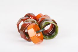 A collection of ten coloured bakelite napkin rings, Condition: Generally good condition with no