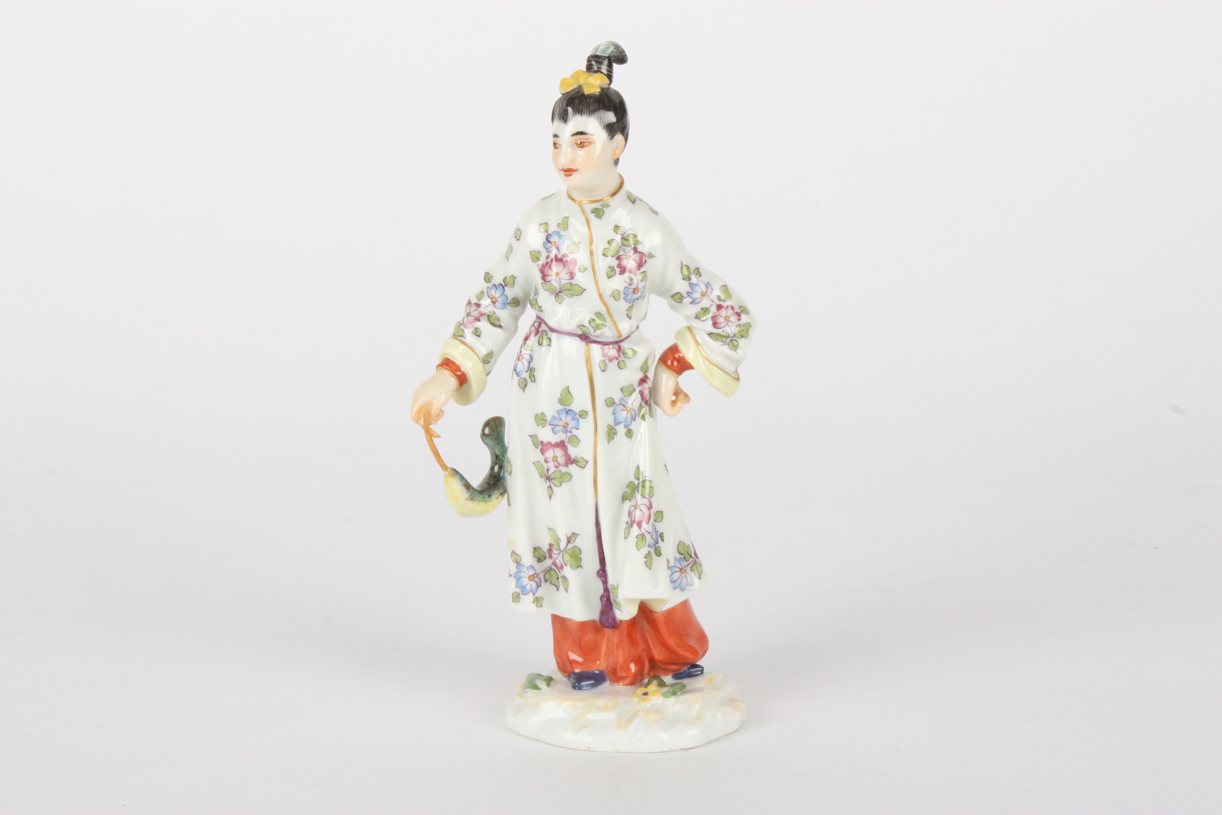 Late 20th century Meissen figure, unknown designer, modelled as Japanese lady standing with a fish