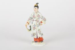 Late 20th century Meissen figure, unknown designer, modelled as Japanese lady standing with a fish