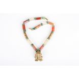 A crystal, cornelian and jasper tubular bead necklace
possibly South American
the crystal, brass and