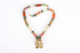A crystal, cornelian and jasper tubular bead necklacepossibly South Americanthe crystal, brass and
