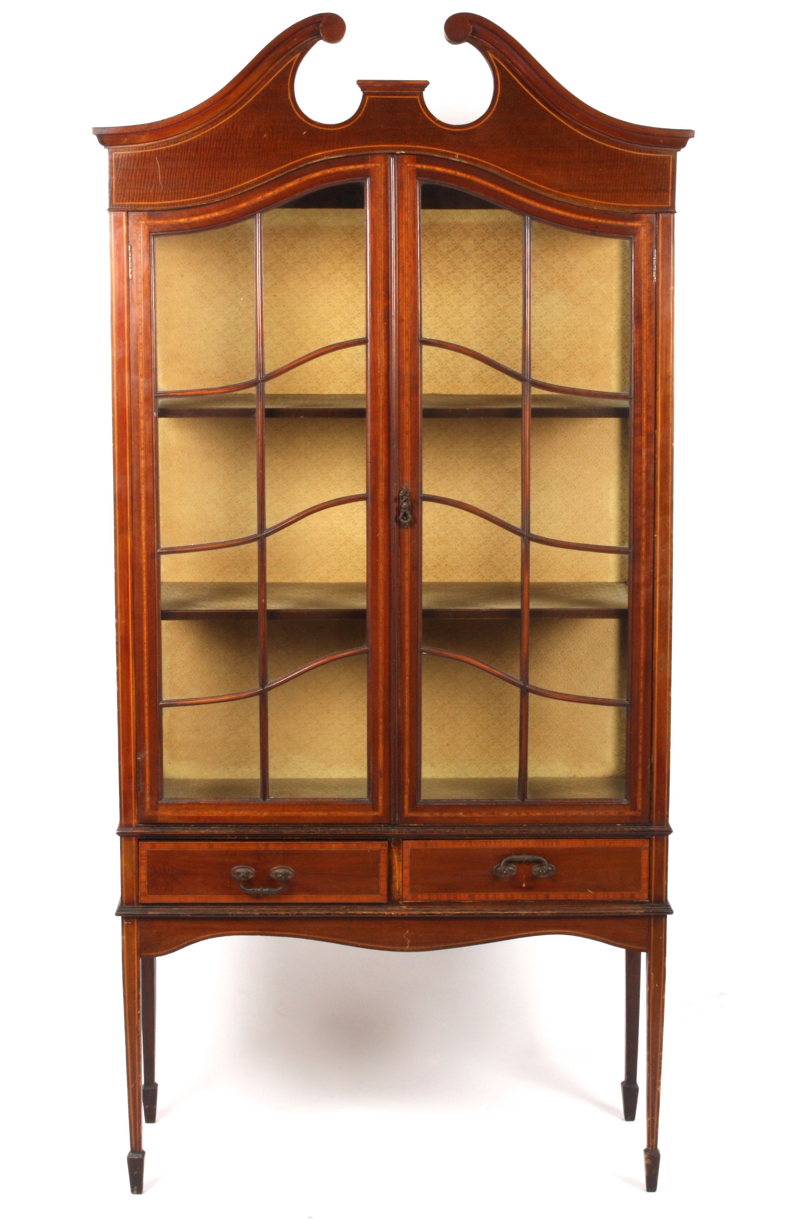 An Edwardian mahogany display cabinet
the two glazed front doors opening to reveal two shelves above