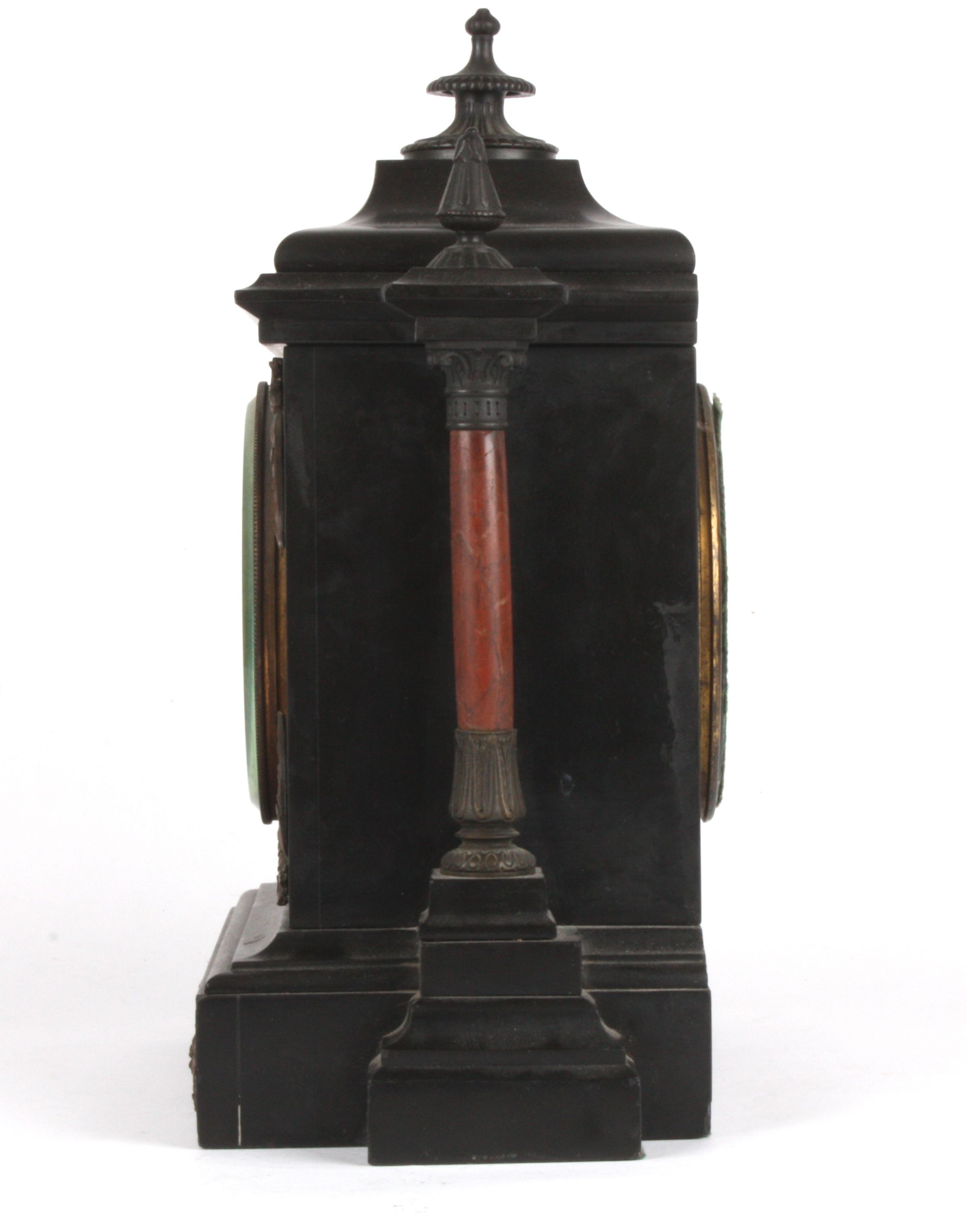 A French late 19th century red and black marble mantle clock
retailed by Howell & Jones
the 5 1/4 - Image 3 of 4