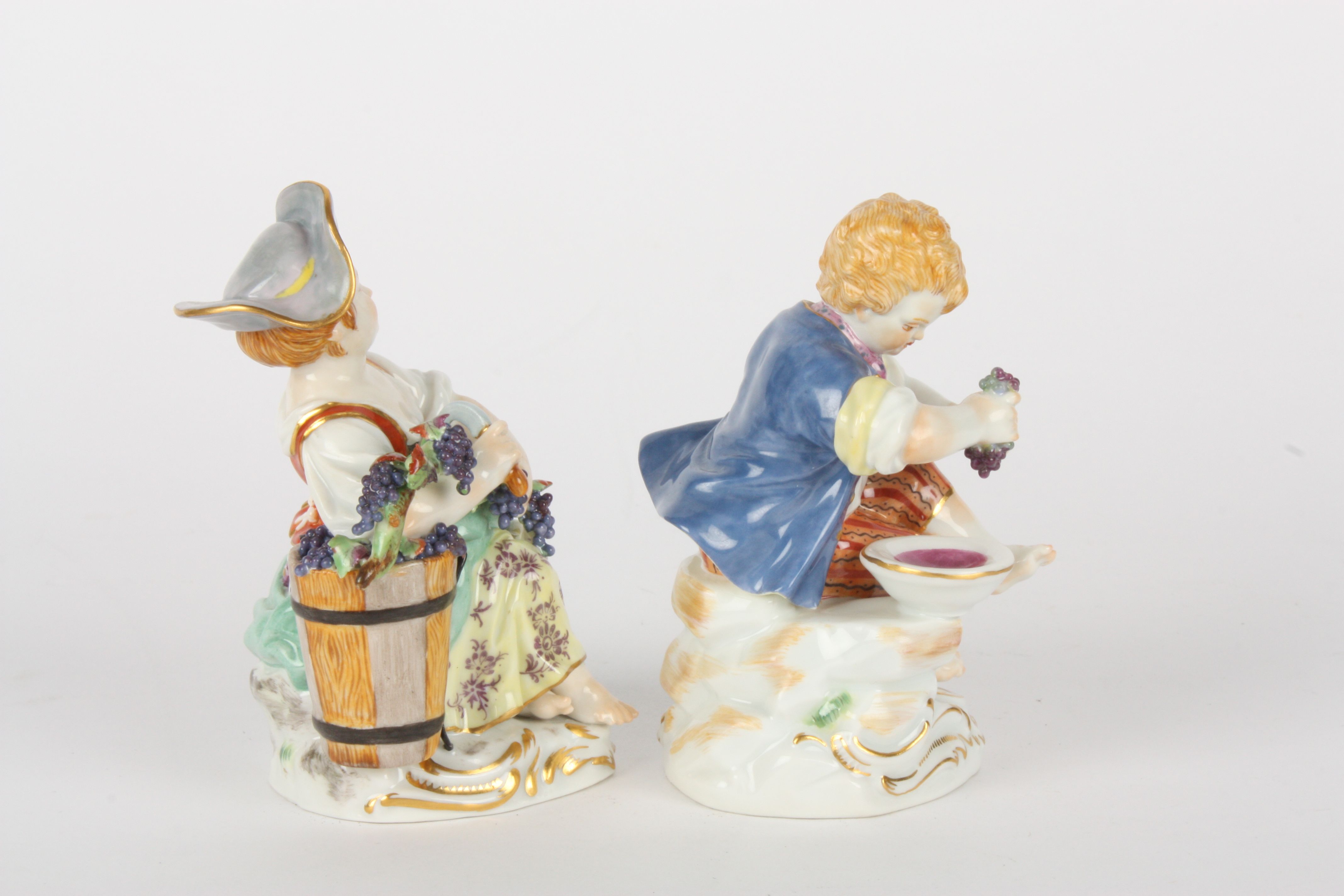 Pair of late 20th century Meissen gardener boy and girl, each modelled seated, girl with basket of - Image 4 of 5