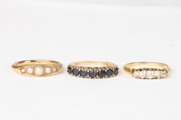 An 18ct gold and diamond five stone ringtogether with a seven stone sapphire and gold ring and a