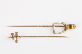 An unusual Victorian gilt metal weather vane tie pintogether an a stirrup tie pin (2), Condition: