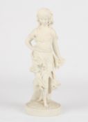 A Victorian style Parian figure of a young girlstood wearing a flowing robe and supported on a