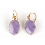 A fine pair of early 20th century Lilac Jade earrings
the oval jade plaques of good vibrant