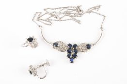 A silver and sapphire necklace and earring setthe necklace with central cluster of seven sapphires,