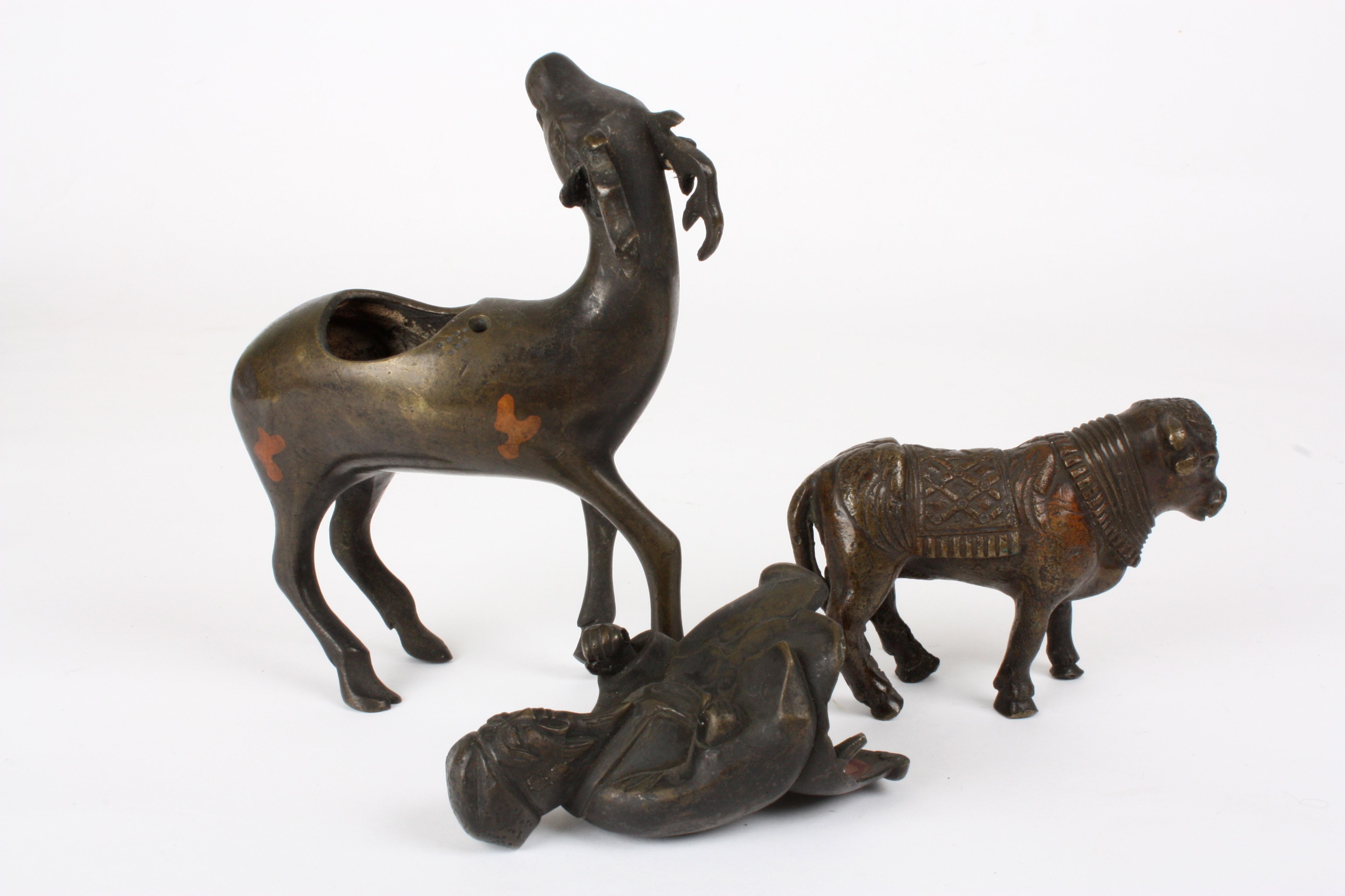 A 19th century Chinese bronze animal incense burner
formed as a sage riding a deer, together with - Image 3 of 3