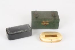 A 19th century lacquer snuff boxinlaid with abalone pieces, together with a horn snuff box and a
