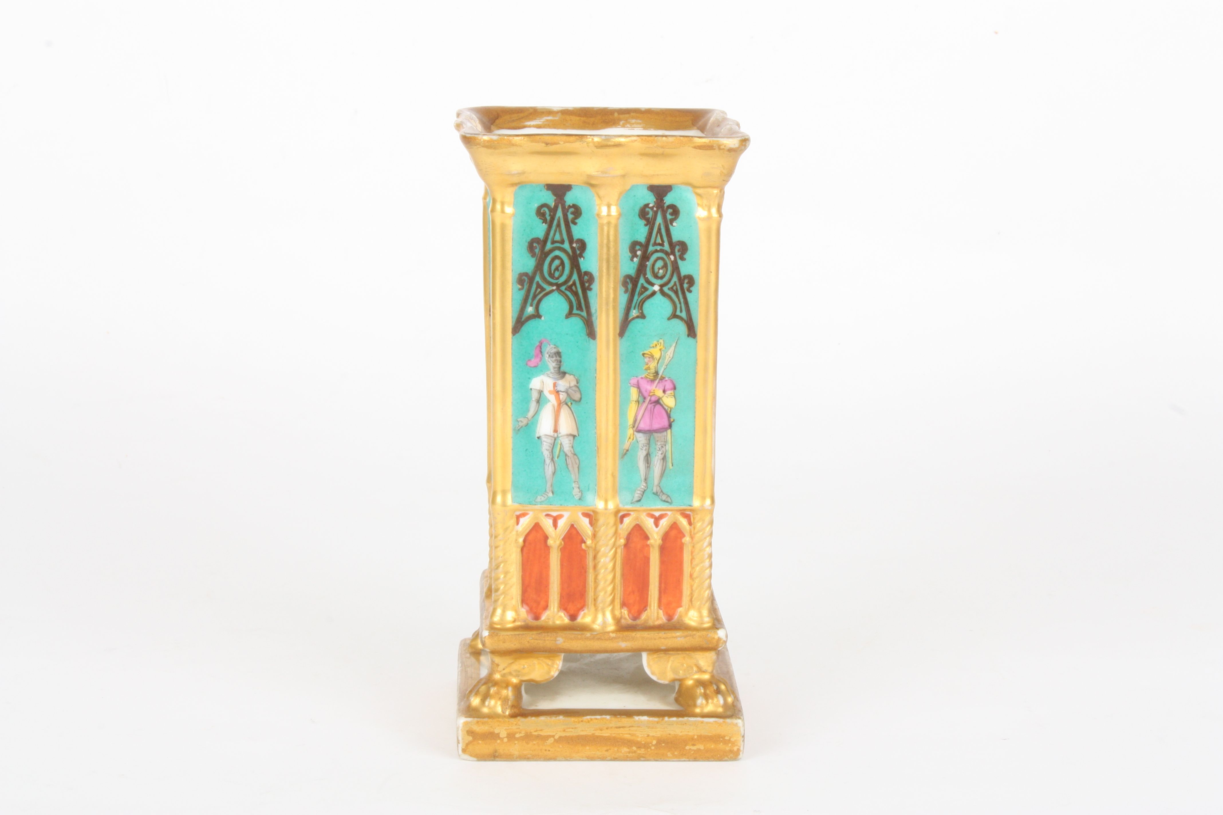 A 19th century French Darte porcelain Gothic design spill vase
of square form, painted with full