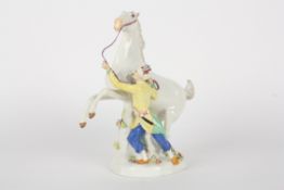 Late 20th century Meissen figure group Turk with Horse, after Kaendler, modelled standing holding