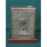 INTERESTING COPPER AND BRASS MANTEL CLOCK,