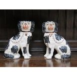 PAIR OF HANDPAINTED AND GILDED STAFFORDSHIRE CERAMIC SPANIELS,