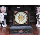 DECORATIVE BLACK SLATE AND MARBLE EFFECT MANTEL CLOCK WITH ENAMELLED DIAL