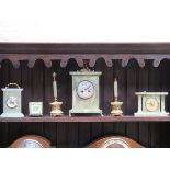 THREE VARIOUS ONYX STYLE MANTEL CLOCKS AND FOLDING TRAVEL CLOCK