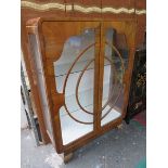 WALNUT VENEERED TWO DOOR GLAZED ART DECO STYLE DISPLAY CABINET (AT FAULT)