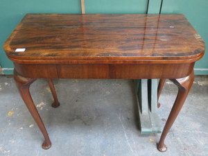 ANTIQUE MAHOGANY FOLD OVER CARD TABLE ON CABRIOLE SUPPORT