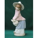 NAO GLAZED CERAMIC FIGURE- GIRL WITH HAT,