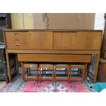 TIMES FURNISHING TEAK LONG JOHN SIDEBOARD ON RAISED SUPPORTS WITH LONG NARROW DROP LEAF TABLE AND