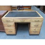 OAK SEVEN DRAWER LEATHER TOPPED PEDESTAL WRITING DESK