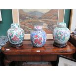 THREE VARIOUS HANDPAINTED CHINESE CERAMIC GINGER JARS WITH COVERS
