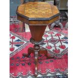 VICTORIAN MAHOGANY INLAID SEWING CABINET ON CARVED TRIPOD SUPPORTS AND FITTED INTERIOR CONTAINING