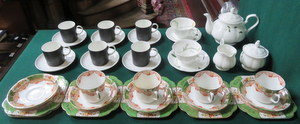 SET OF SIX WEDGWOOD SUSIE COOPER DESIGN 'CONTRAST' CUPS AND SAUCERS.