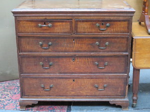 ANTIQUE OAK AND MAHOGANY TWO OVER THREE CHEST OF DRAWERS