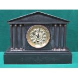 DECORATIVE BLACK SLATE COLUMN FORM MANTEL CLOCK WITH GILT METAL DIAL