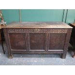 ANTIQUE OAK PANELLED AND CARVED COFFER