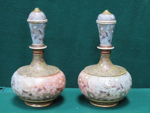 PAIR OF DOULTON LAMBETHS AND SLATERS FLORAL DECORATIVE AND GILDED CERAMIC VASES WITH COVERS (AT