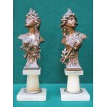 PAIR OF FRENCH STYLE ART NOUVEAU PAINTED SPELTER BUSTS ON ONYX STANDS,