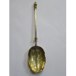 EARLY VICTORIAN SILVER AND SILVER GILT PRESENTATION SPOON DECORATED WITH LEAVES AND BERRIES