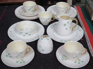 EIGHTEEN PIECES OF BELLEEK BASKET WEAVE SHAMROCK DESIGN TEAWARE, GREEN MARK, 1965-1980.