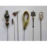 SIX VARIOUS HAT PINS INCLUDING ONE 9ct GOLD INITIALLED 'L.E.