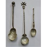 THREE VARIOUS DECORATIVE SILVER SPOONS