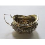 HALLMARKED SILVER REPOUSSE DECORATED SMALL MILK JUG,