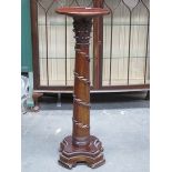 CARVED MAHOGANY TORCHERE STAND