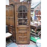 PRIORY STYLE CARVED OAK GLAZED CORNER CUPBOARD