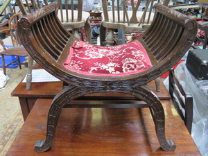 DARK OAK CARVED X-FRAMED DRESSING STOOL