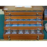 WOODEN SPECIMEN CHEST OF FIVE DRAWERS CONTAINING COLLECTION OF SIXTY 'THE BRITANNICA COMMEMORATIVE