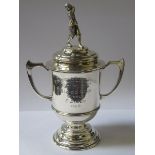 HALLMARKED SILVER TWO HANDLED TROPHY WITH COVER FEATURING A GOLFER (AT FAULT), LONDON ASSAY,